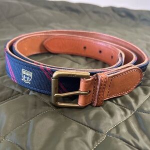 Polo Ralph Lauren Men’s brown leather and silk grosgrain repp crest belt. 42W